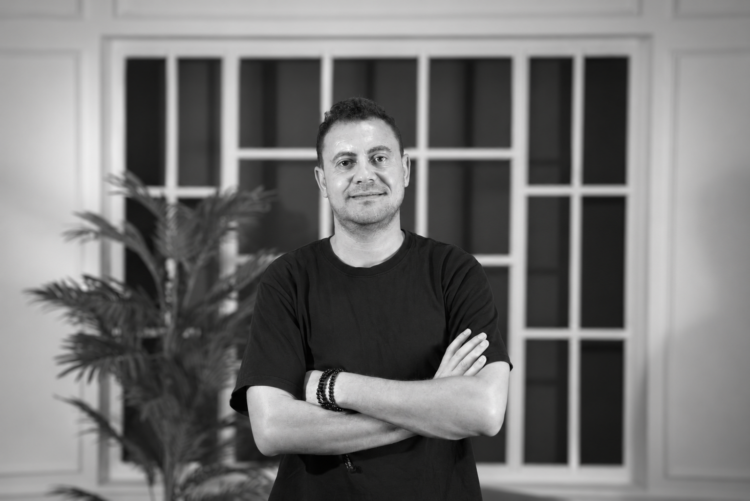 Black and white portrait of Emad, also known as Li Jian